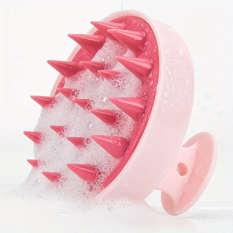 Brosse de massage pour le cuir chevelu