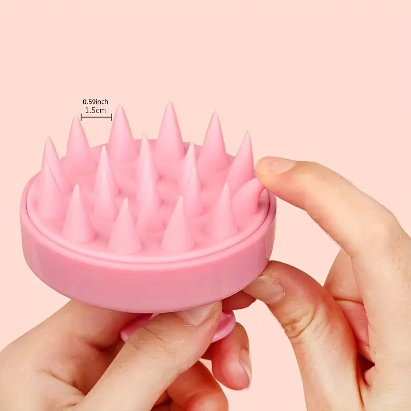 Brosse de massage pour le cuir chevelu